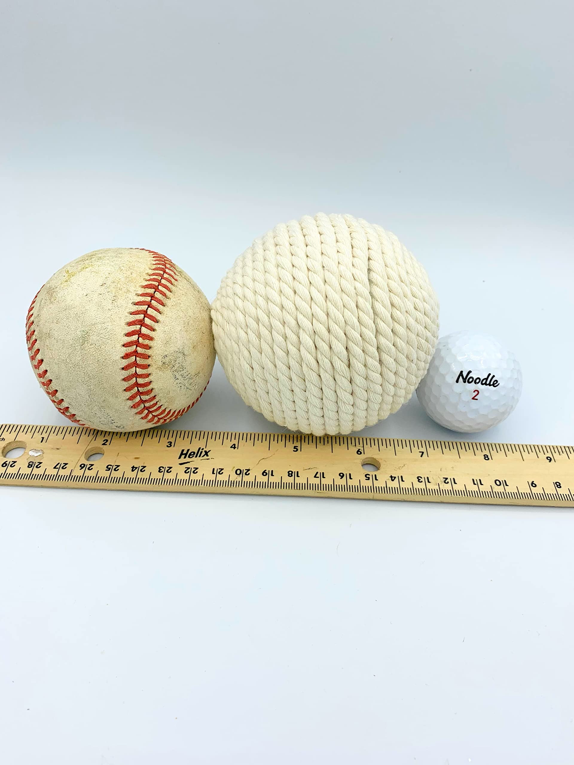 Neutral tone rustic decor ball for shelves and trays