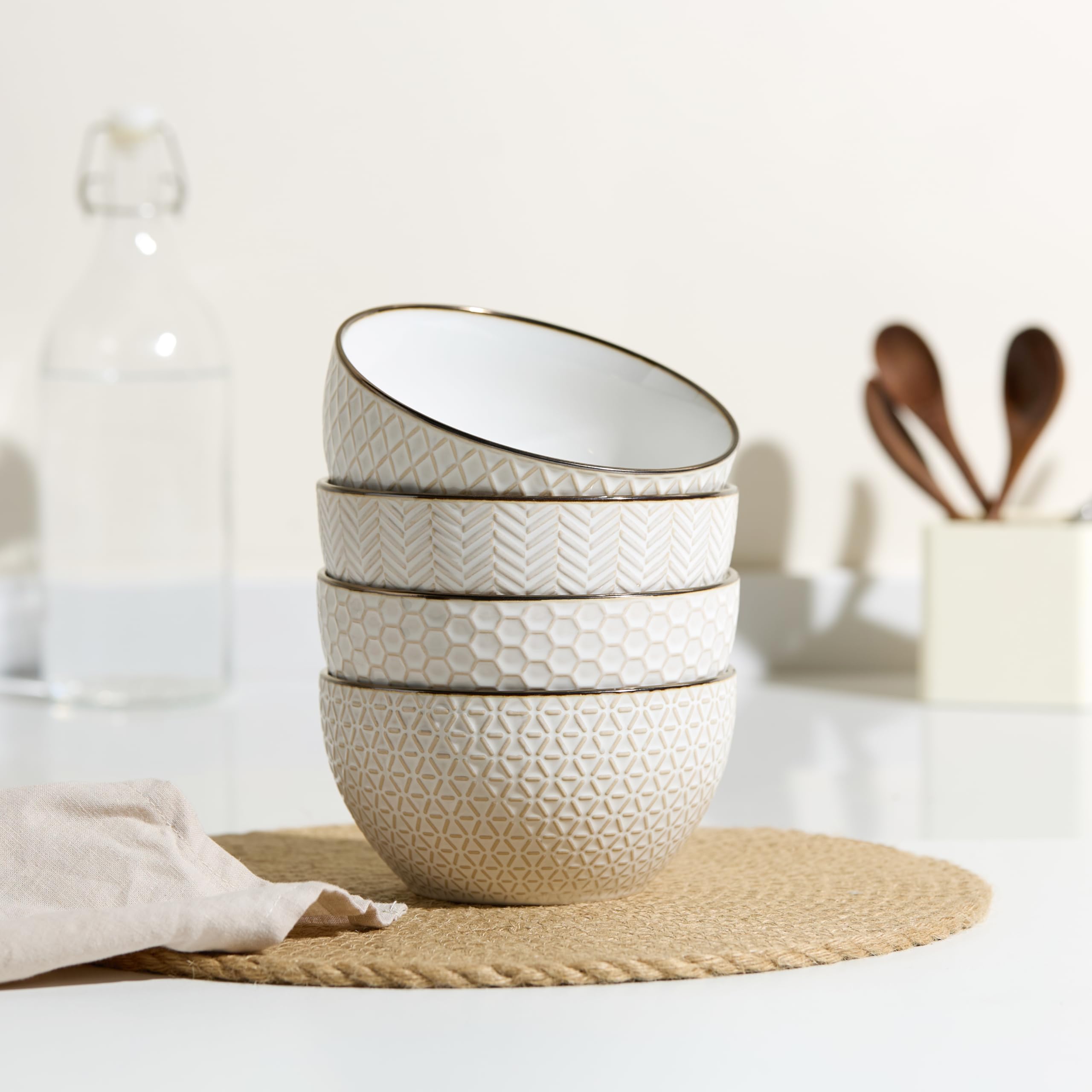Embossed geometric pattern cream stoneware bowls