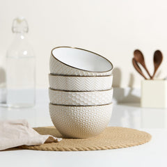Embossed geometric pattern cream stoneware bowls