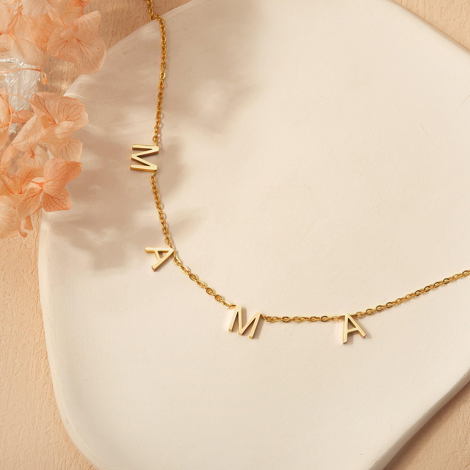 Gift box contents featuring two sunflower items and Mama necklace