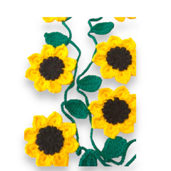 Crochet sunflower garland with six sunflowers on a green chain