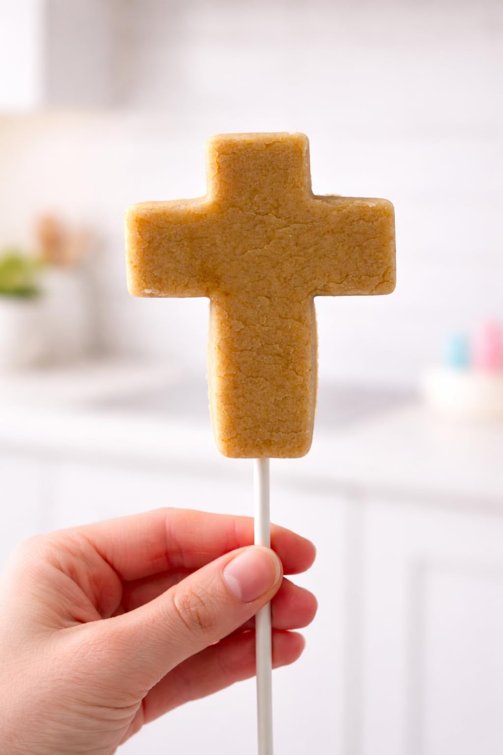 Cross shaped cake pop cutter used for Easter desserts
