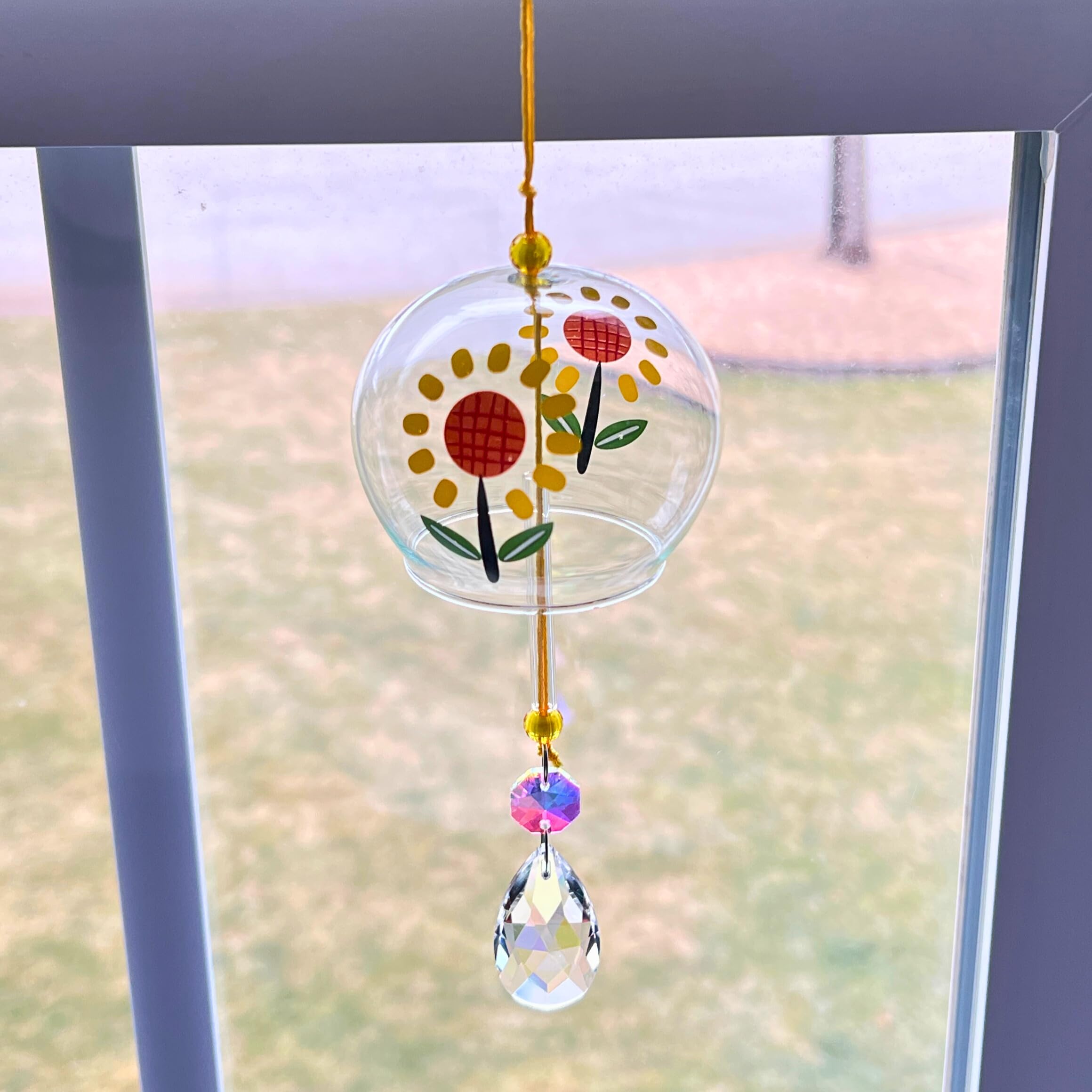 Hand-painted glass ornament sun catcher with floral designs