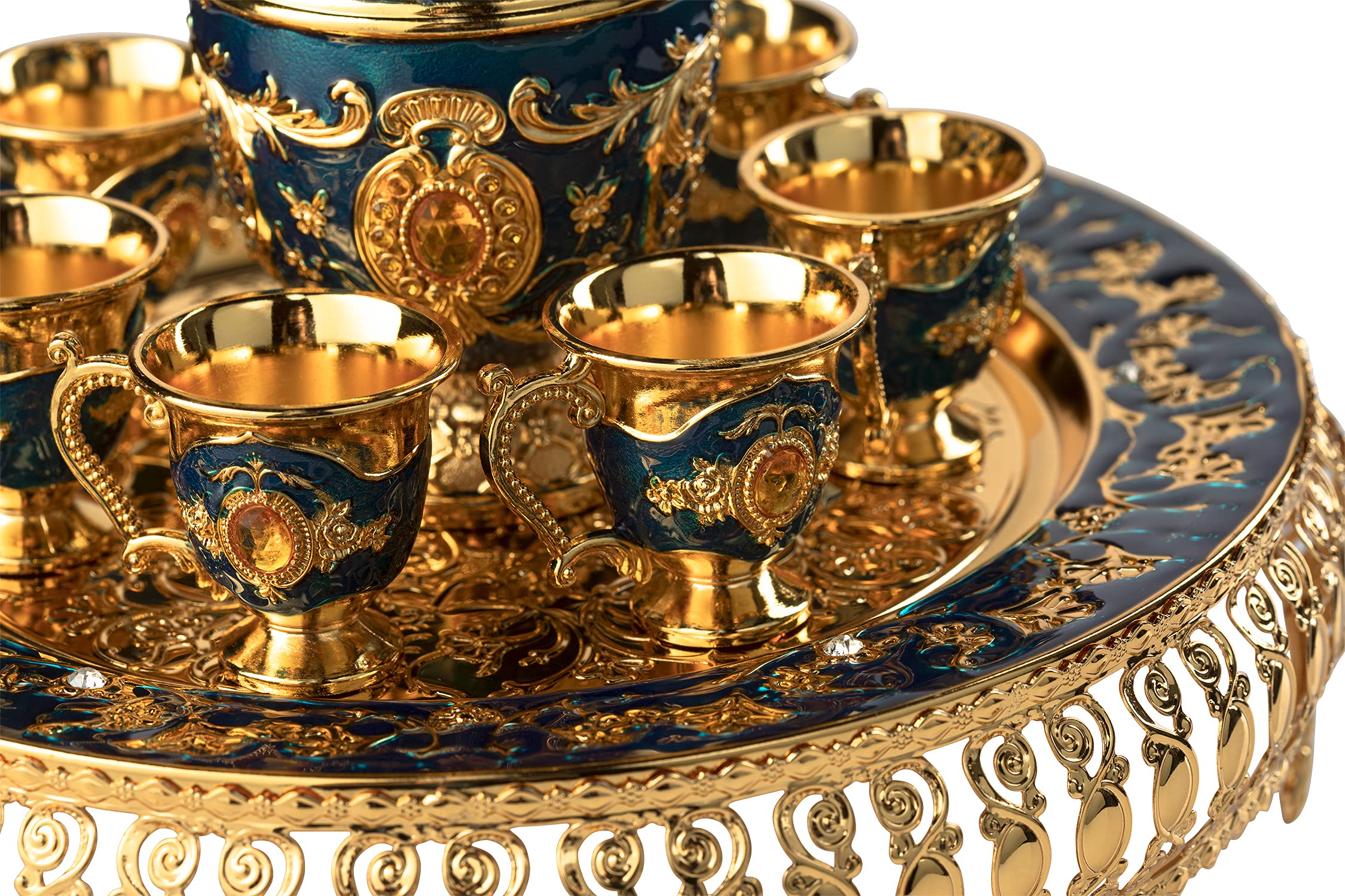 Crystal stones inserted teapot displayed with silver finish