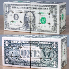 Dollar Cube 3x3 showing three printed dollars on puzzle faces