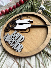 Includes wood beads and twine for hanging on the tree