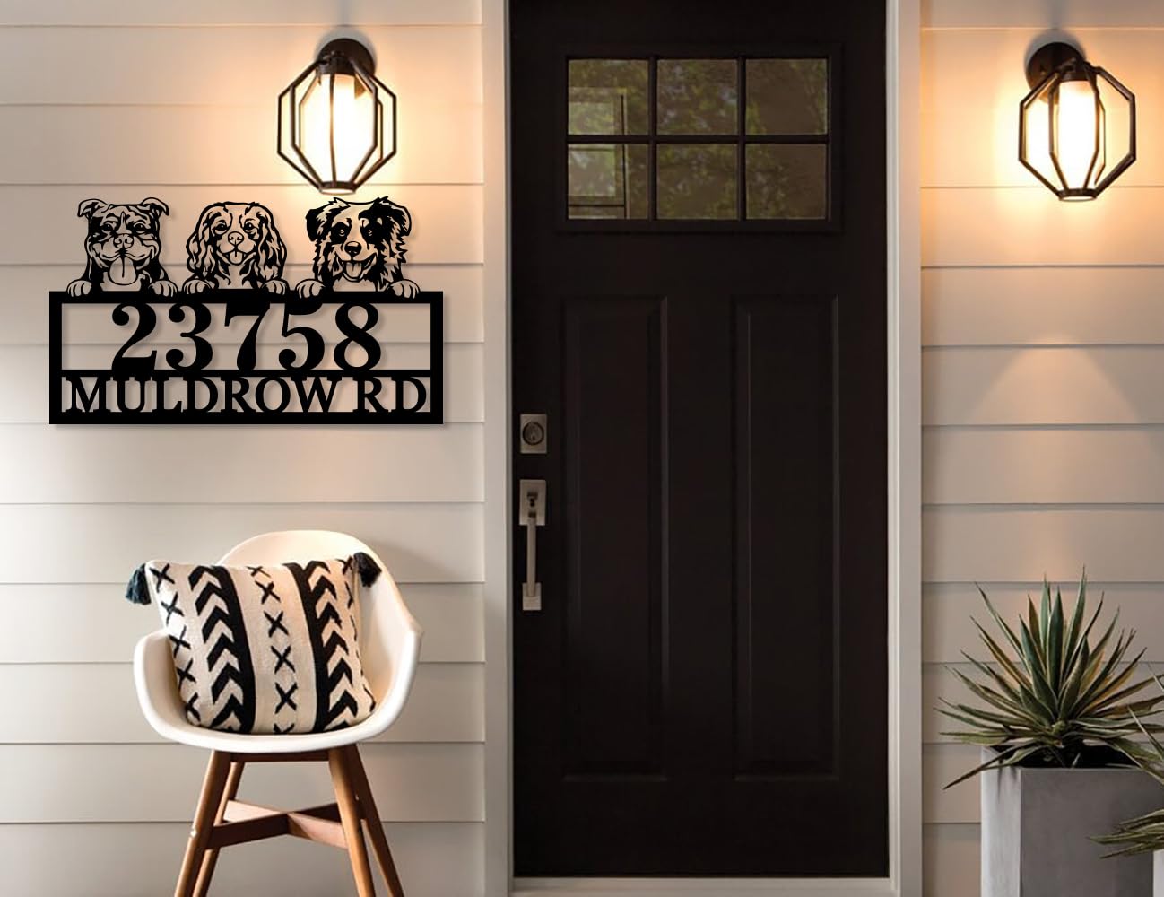 Large metal wall sign displaying house number