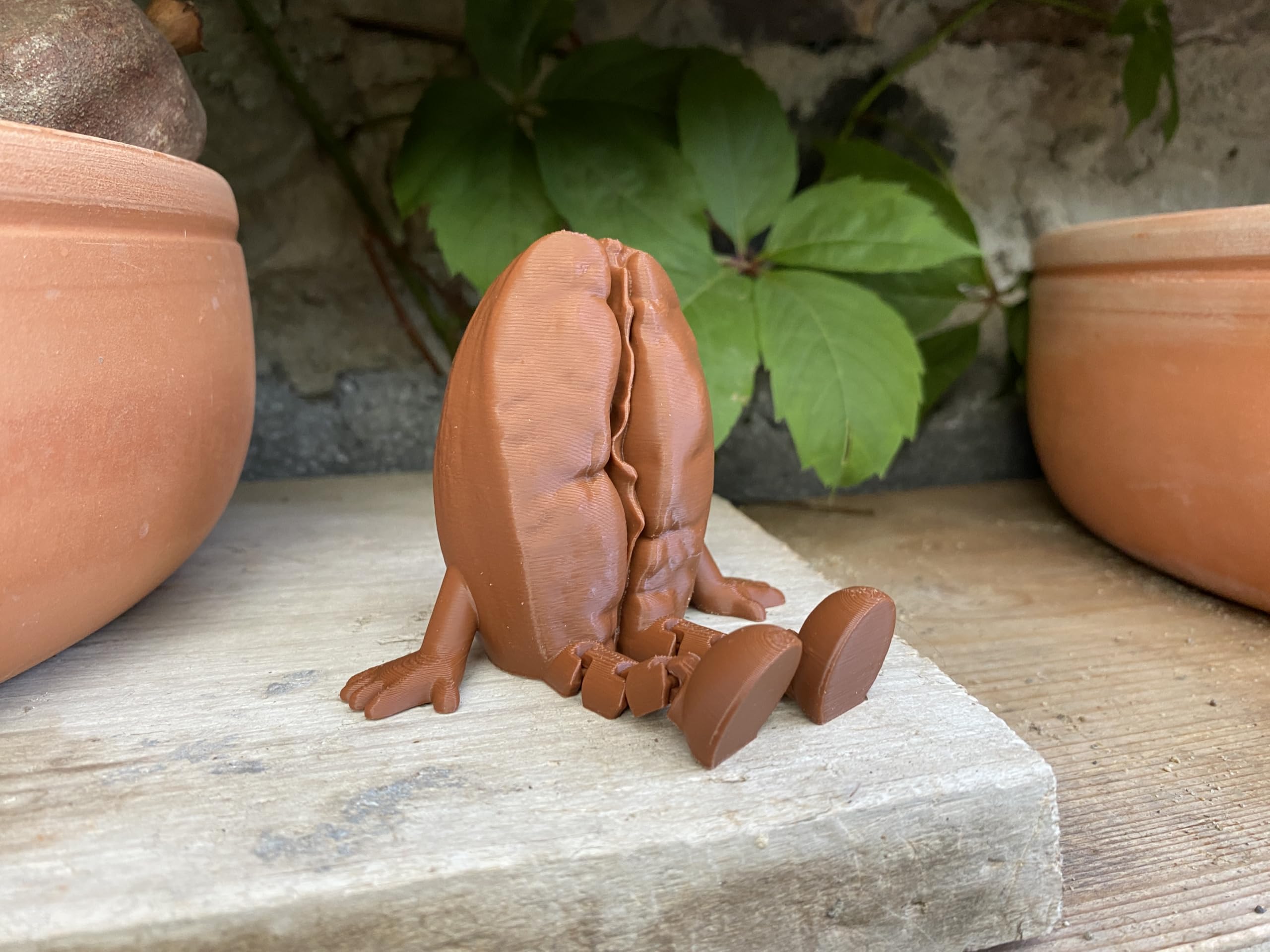 Cute coffee decor bean figurine on bookshelf