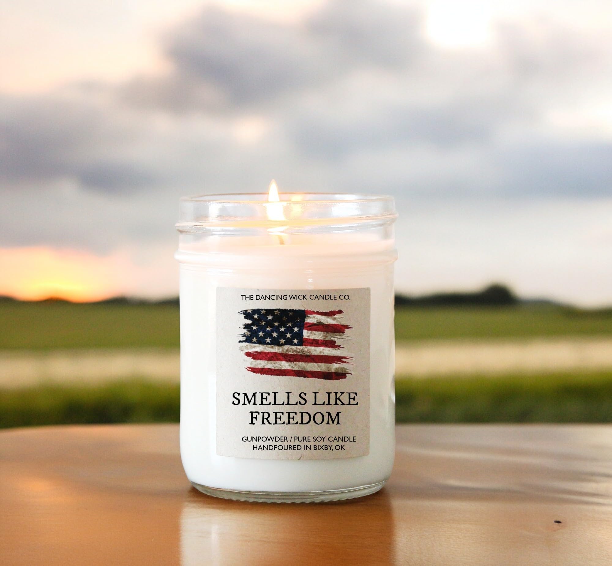 The Dancing Wick candle in rustic patriotic design with American flag label