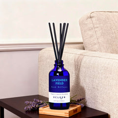 Six rattan diffuser sticks arranged for fragrance