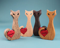 Dark color wooden cat statue handcrafted from oak