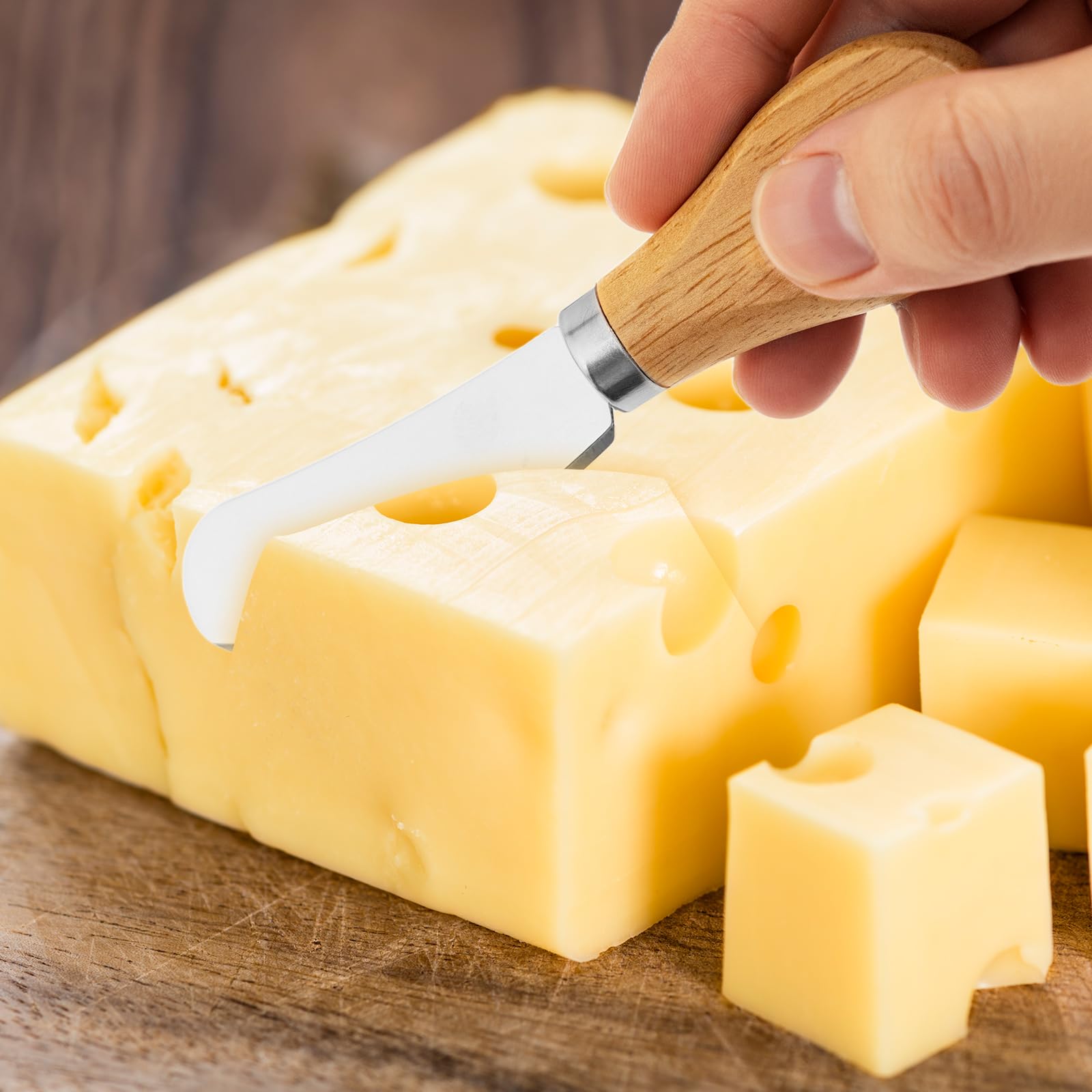Close up of Darlingao cheese knives with wooden handles