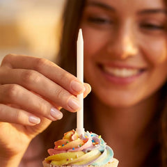 Integrated holders keep candles upright on cake