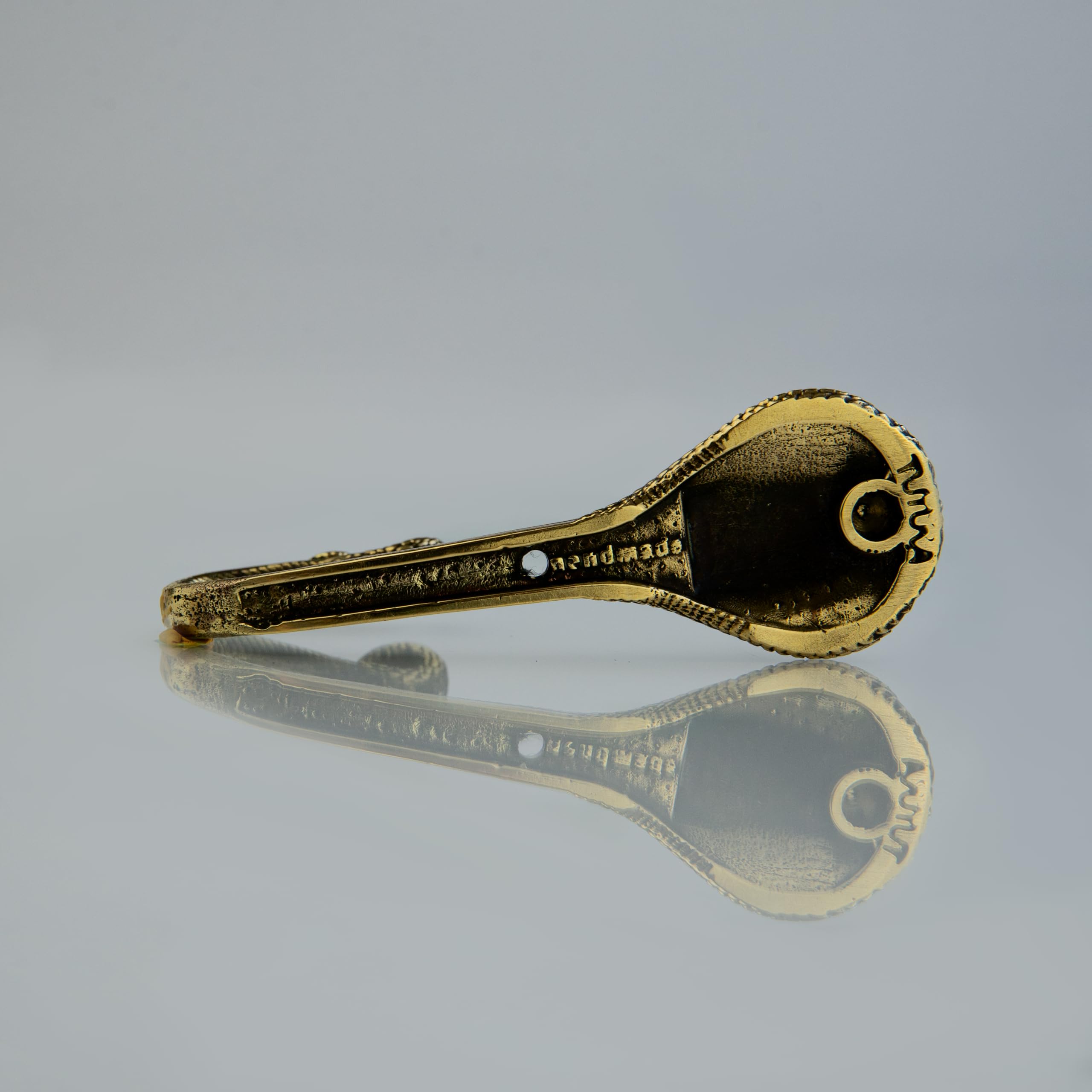 Decorative brass wall mount hook