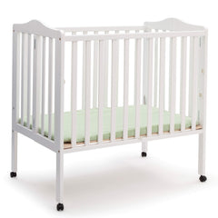 Delta Children folding portable mini baby crib white