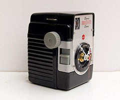 Desk clock from recycled camera parts with quartz movement