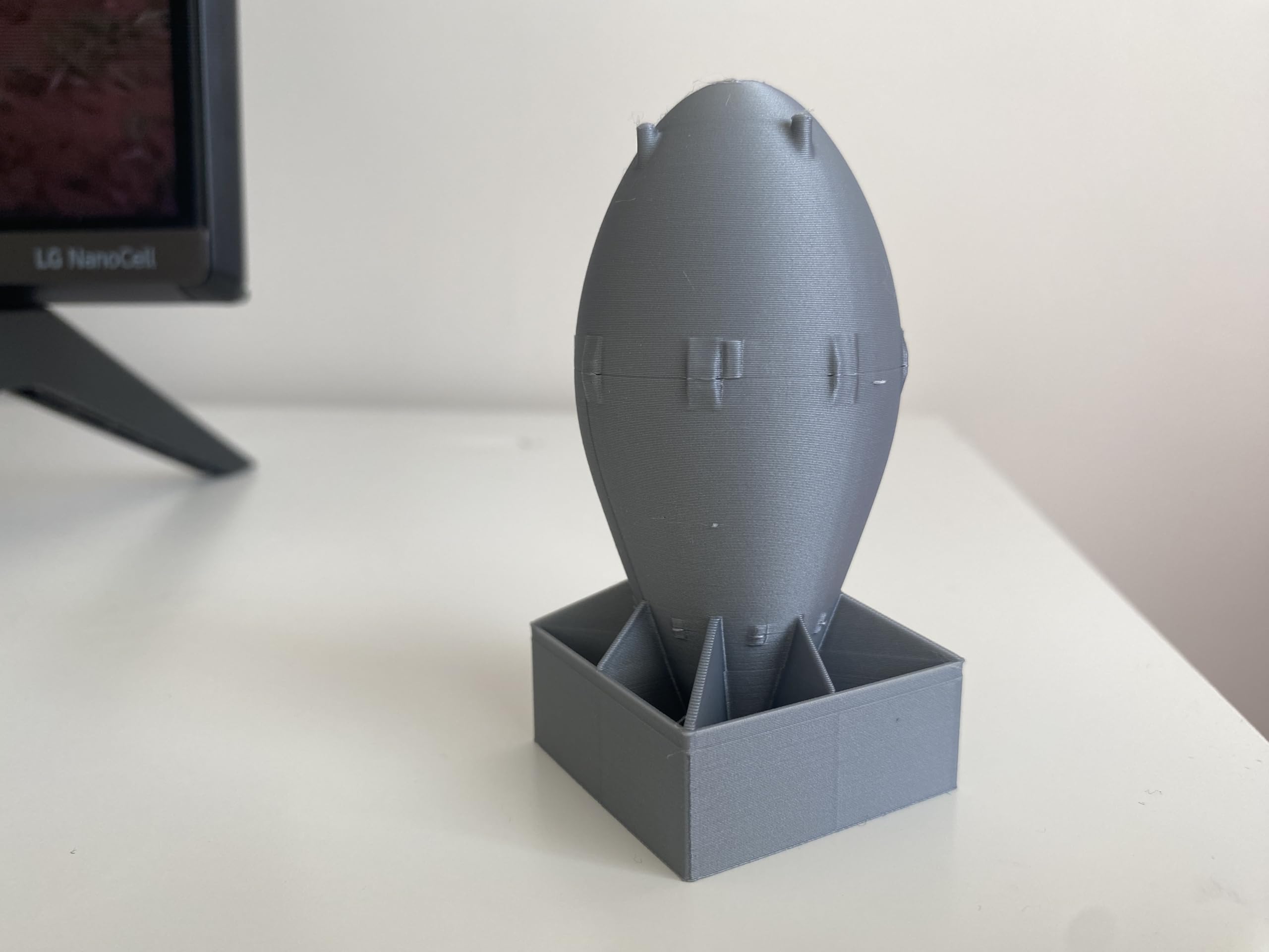 Desk display piece for cabinets or shelves