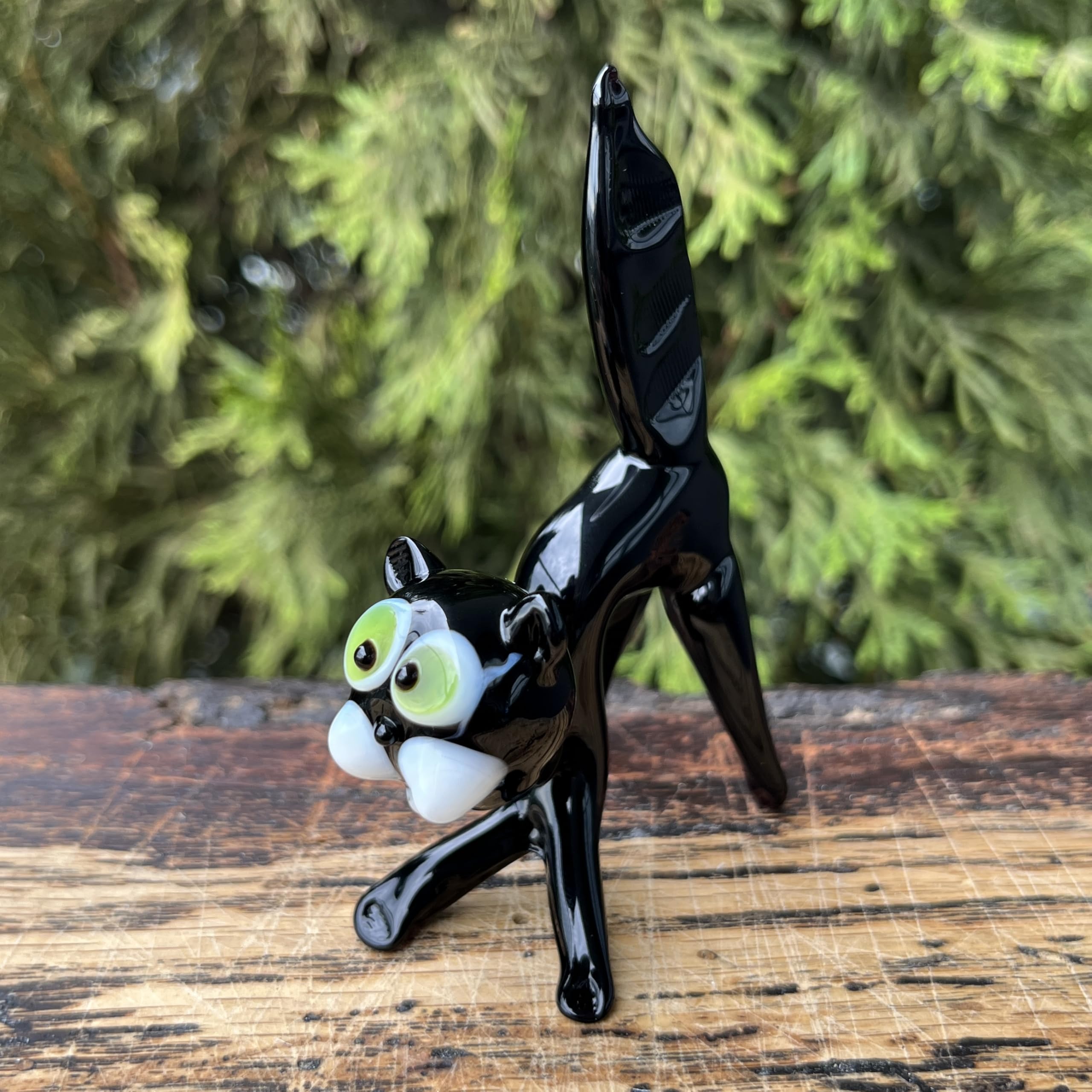 Collectible glass animal cat figurine on stand