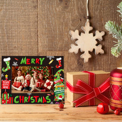Desktop display of 4x6 inch photo in a black Merry Christmas frame