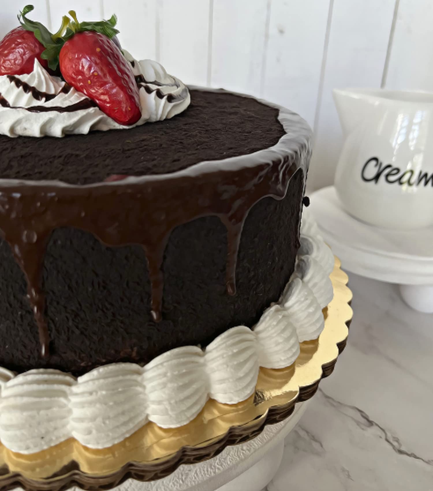 Artificial cake on 10 inch board for display