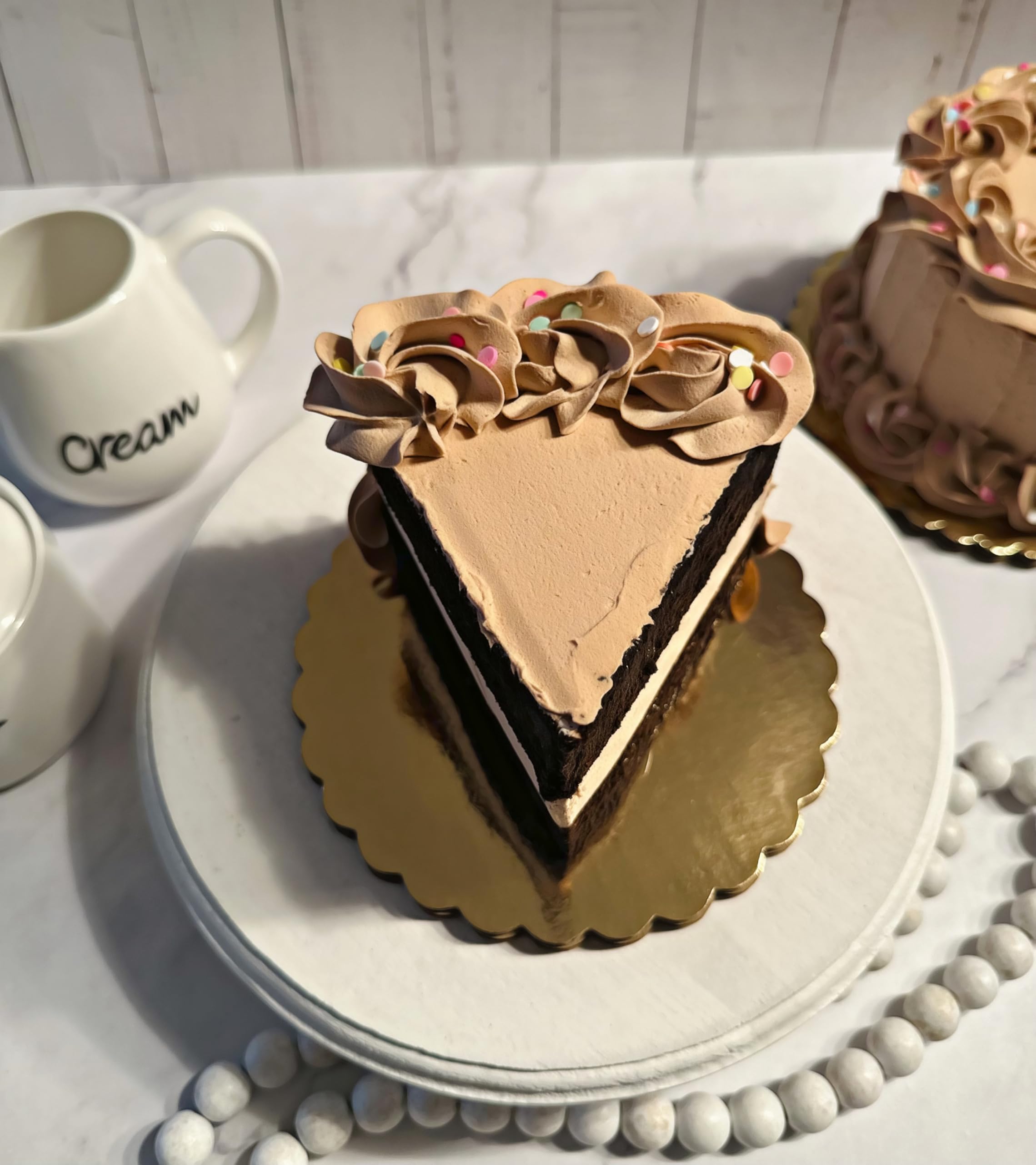 Dezicakes business display fake cake slice