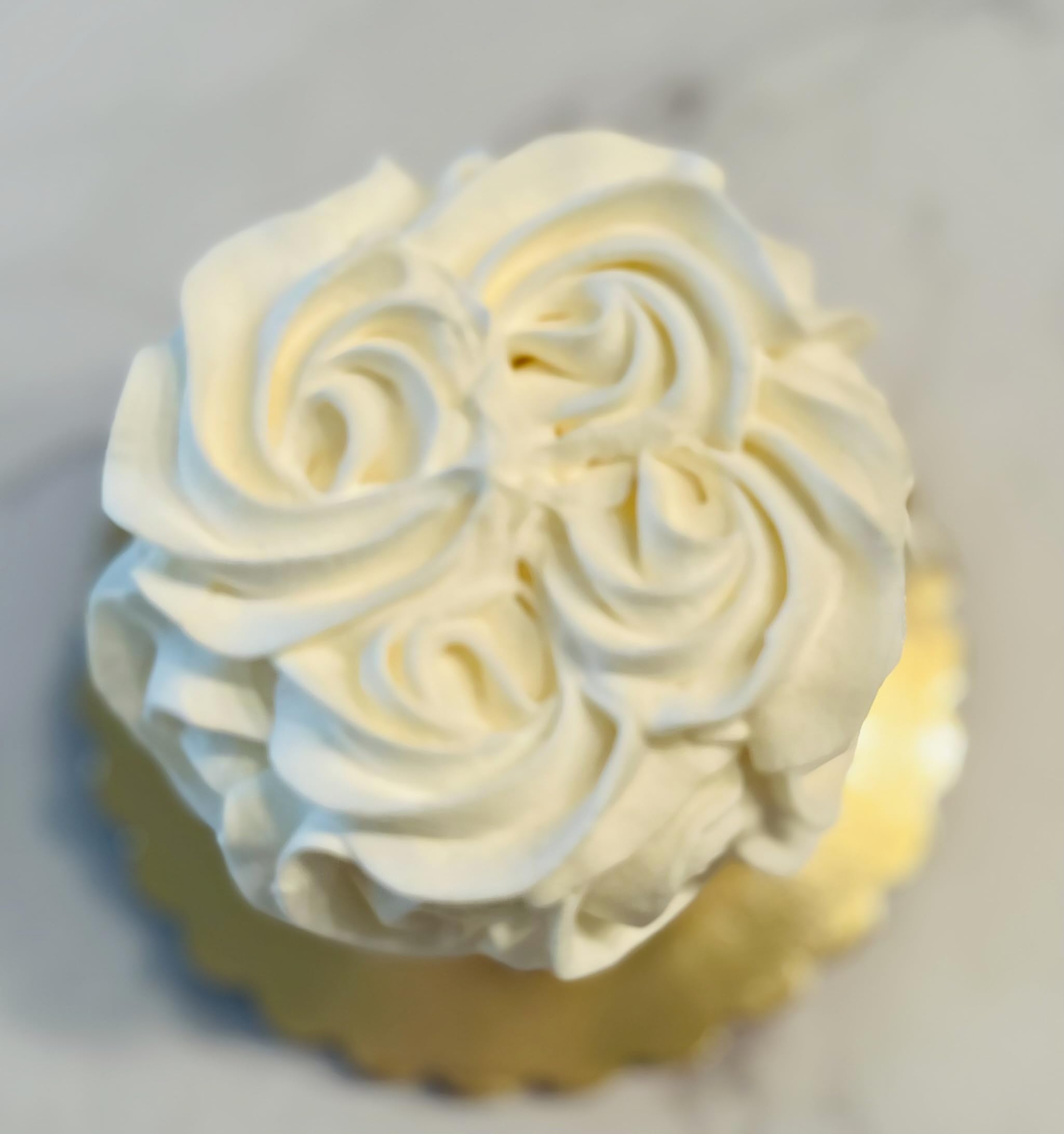Decorative fake cake on cake board for home display