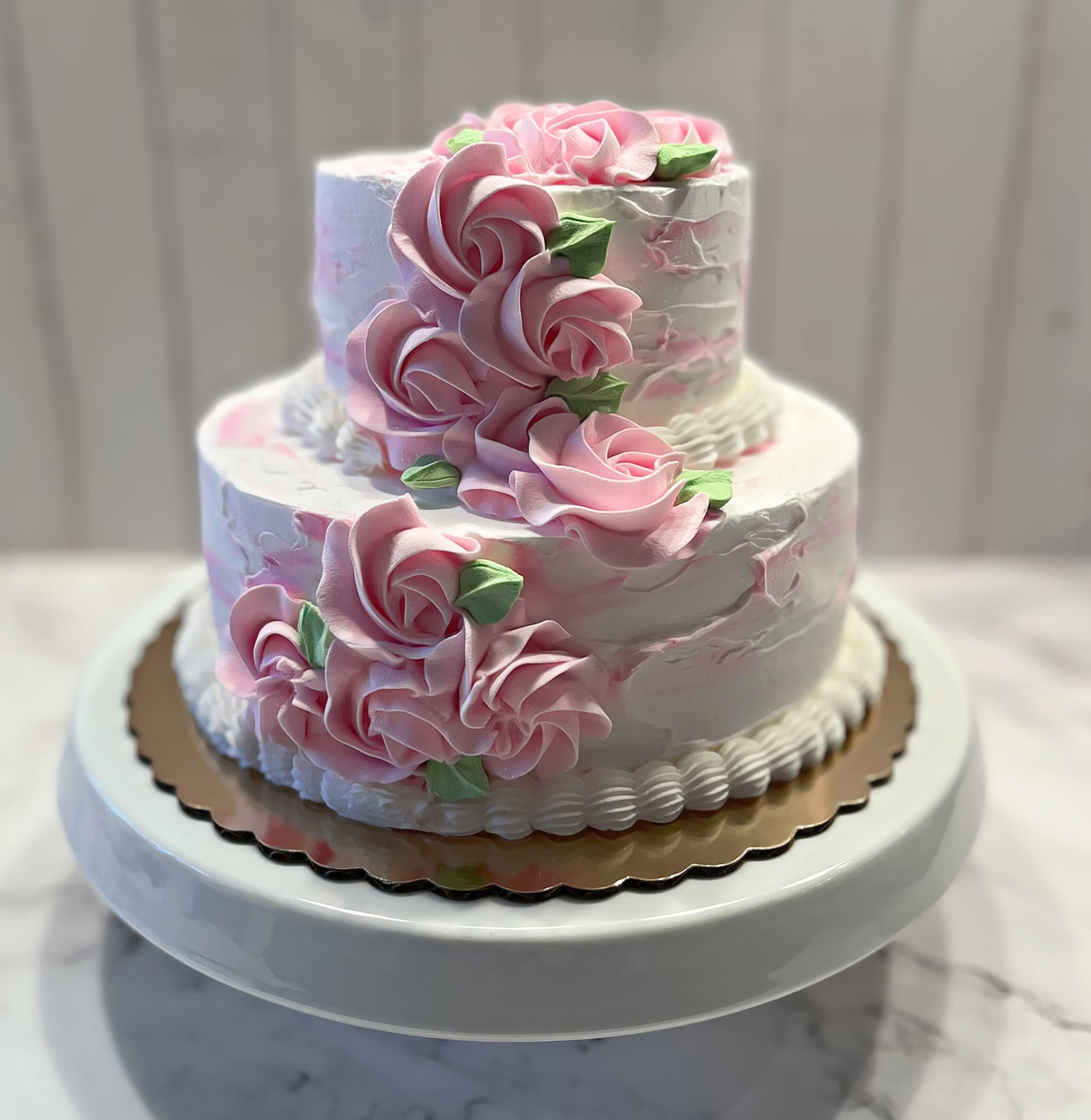 Fake wedding cake by Dezicakes on display