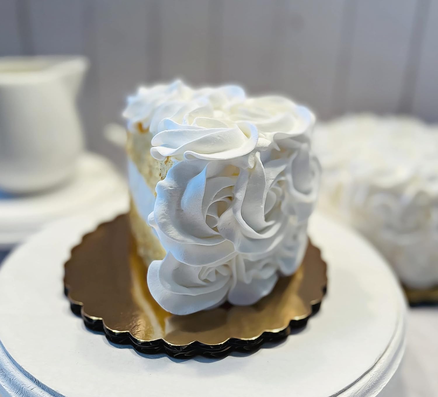 White wedding cake slice decor by Dezicakes