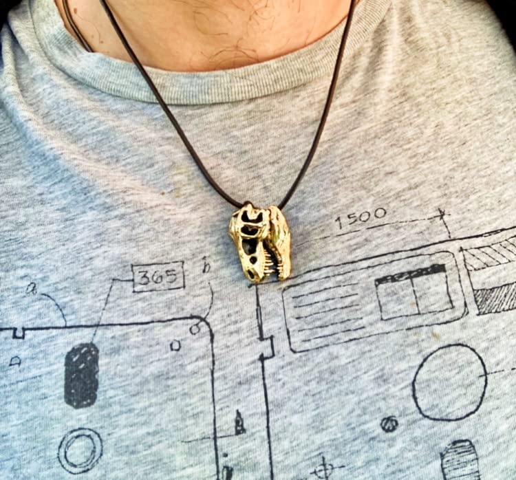 Dinosaur keychain brass pendant close up