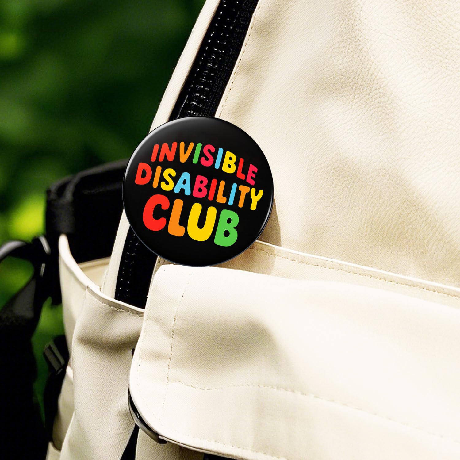 Disability Pride badge ready to attach to jacket or bag