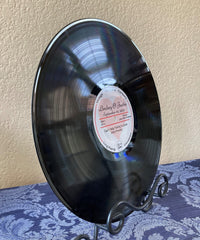 Wall display of 12-inch vinyl record decor with names and date