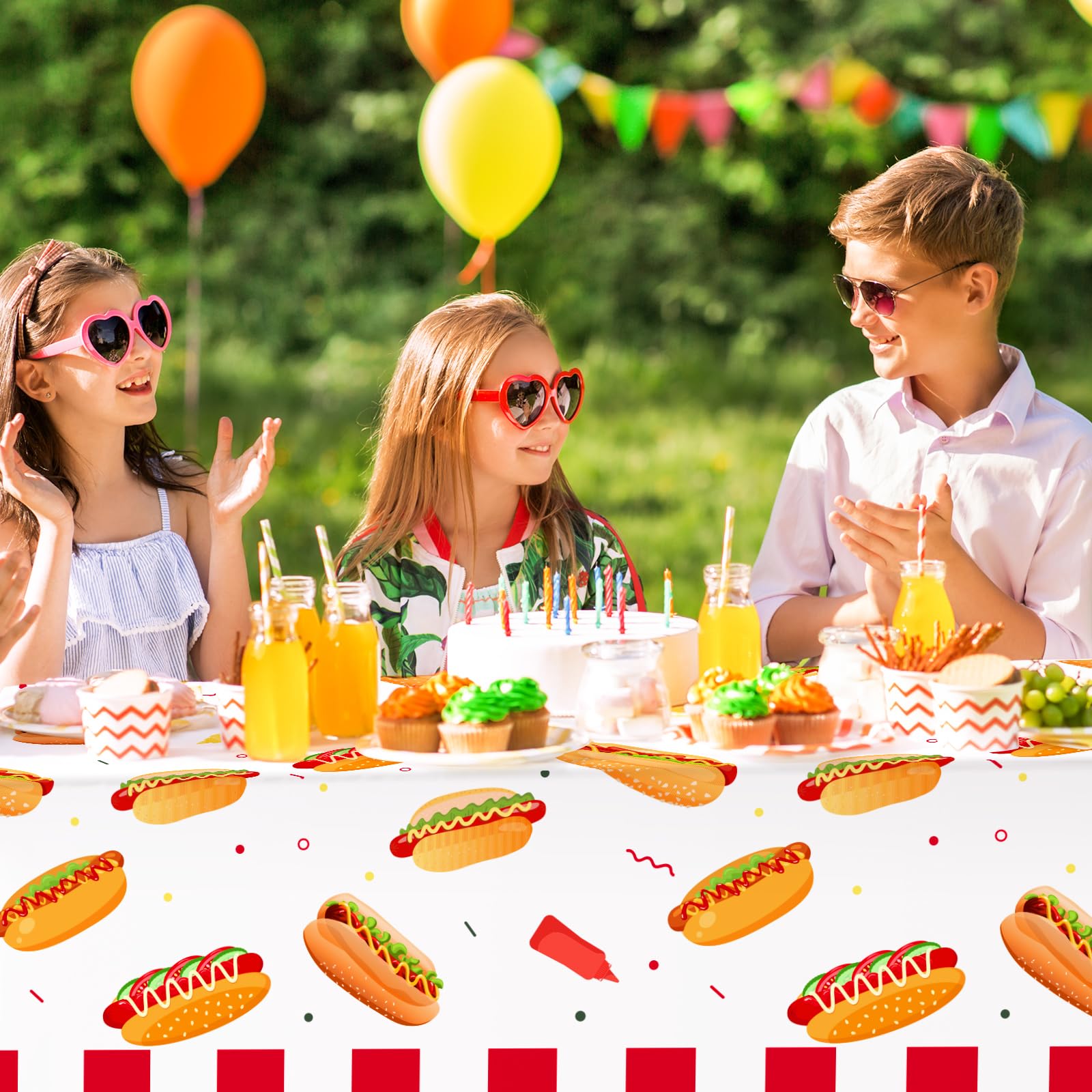 Six disposable tablecloths laid out for BBQ picnic use