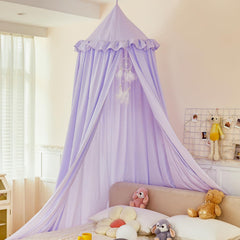 Purple canopy over kid's bed showcasing princess decor