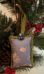 Handmade Dodo ornament measures 2 1/2 by 3 1/2 inches with yoyos on front and back