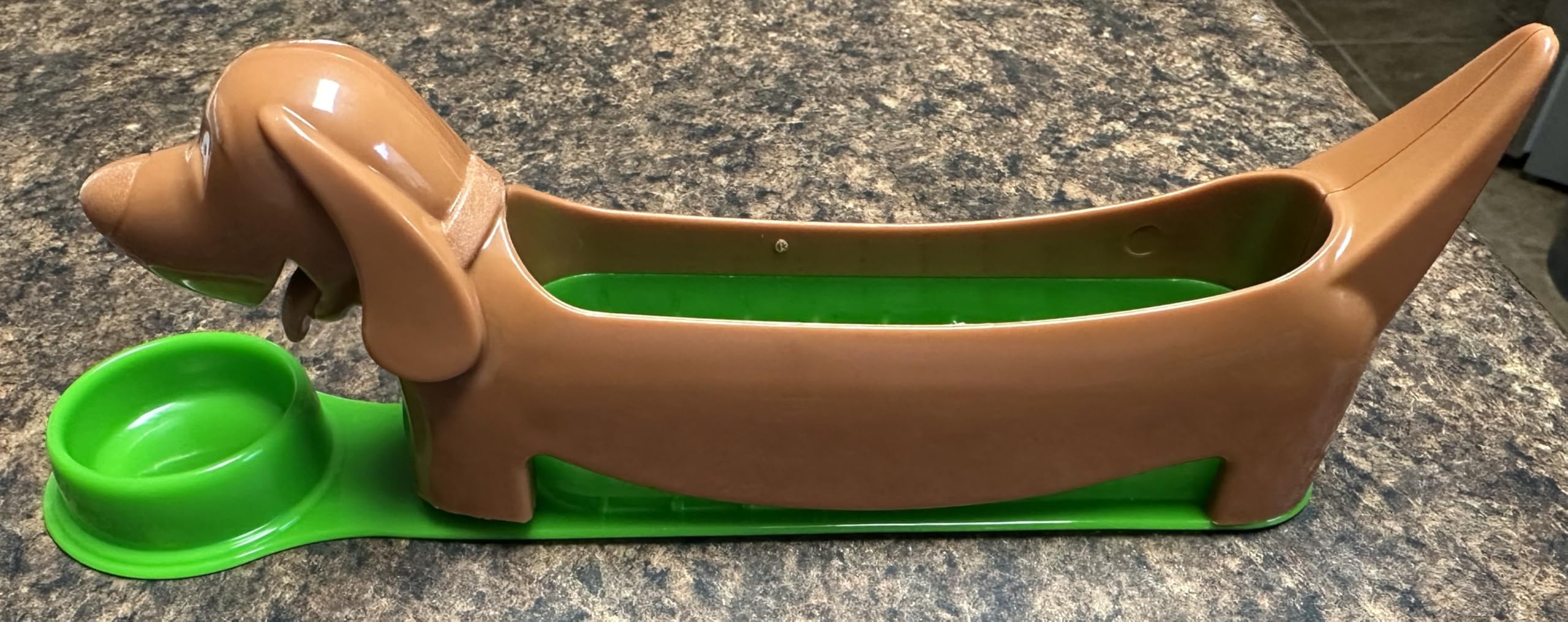 Compact plastic hot dog cutter image