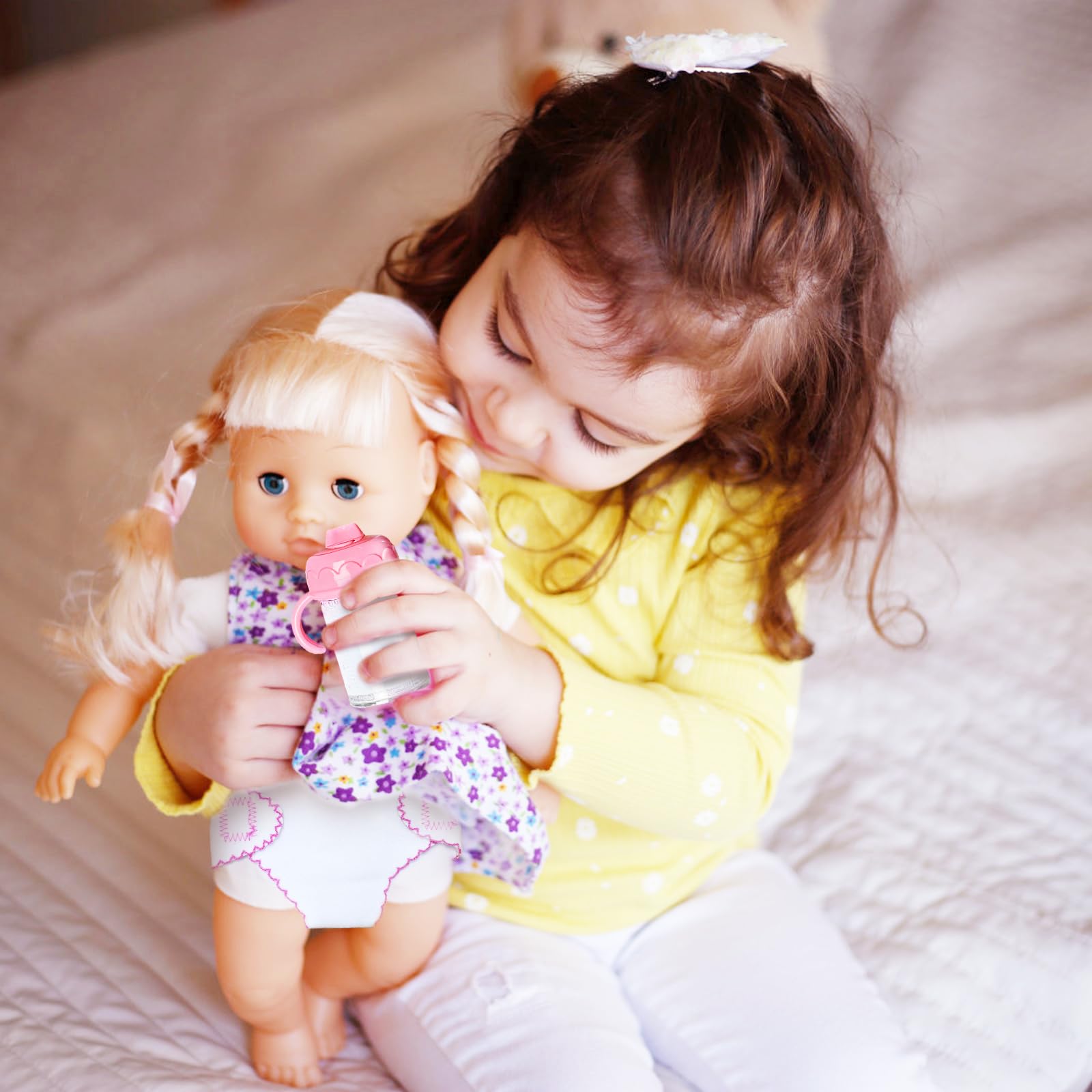 Two forks from the 15 piece doll feeding kit