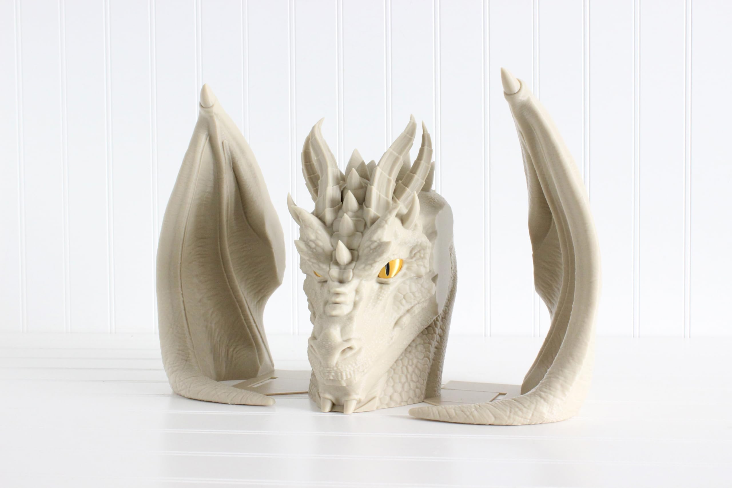 3D printed dragon decor on bookshelf