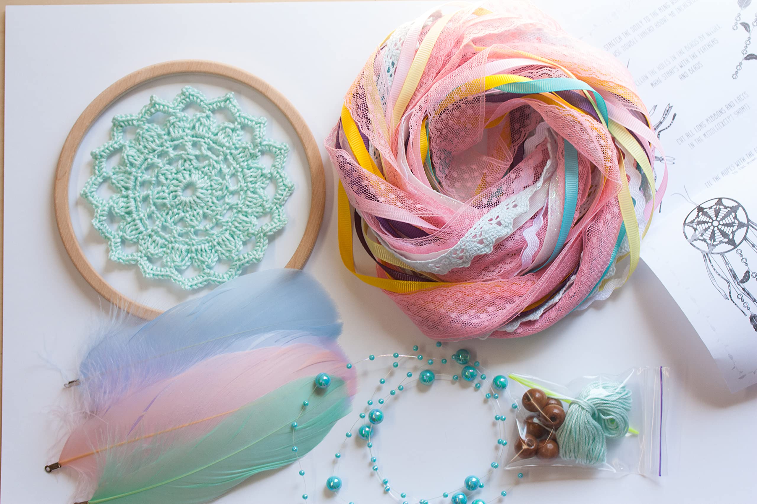 Assorted hanging materials and ribbons in Dream Catcher Kit