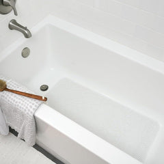 In-tub use bath mat with bottom suction cups for grip