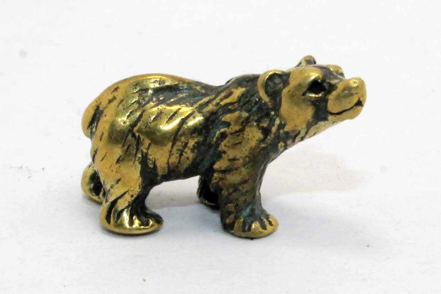 Compact brass figurine display Edysons