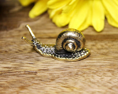 Handmade brass snail sculpture from EDYSONS