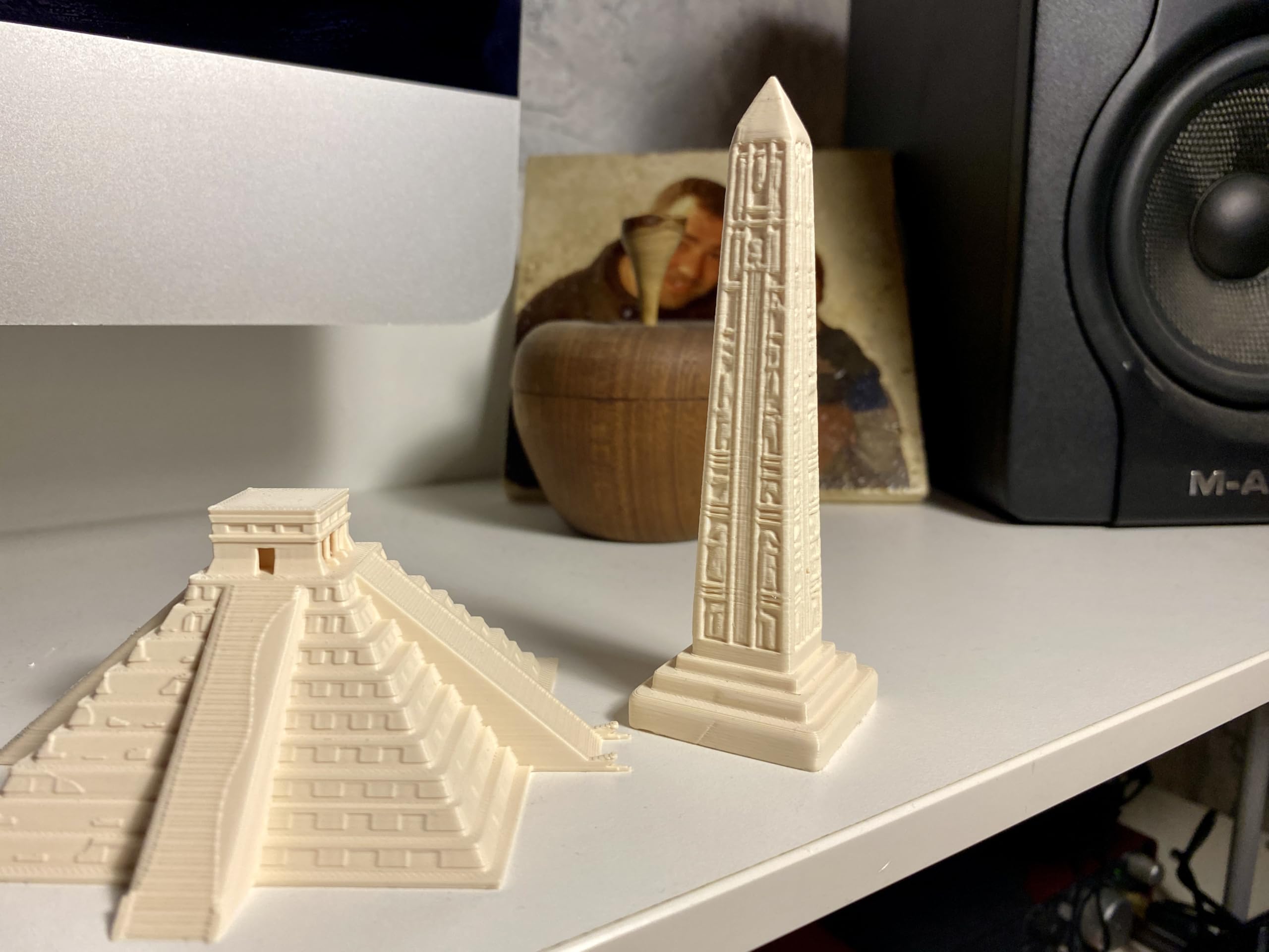 Egyptology inspired obelisk decor on altar