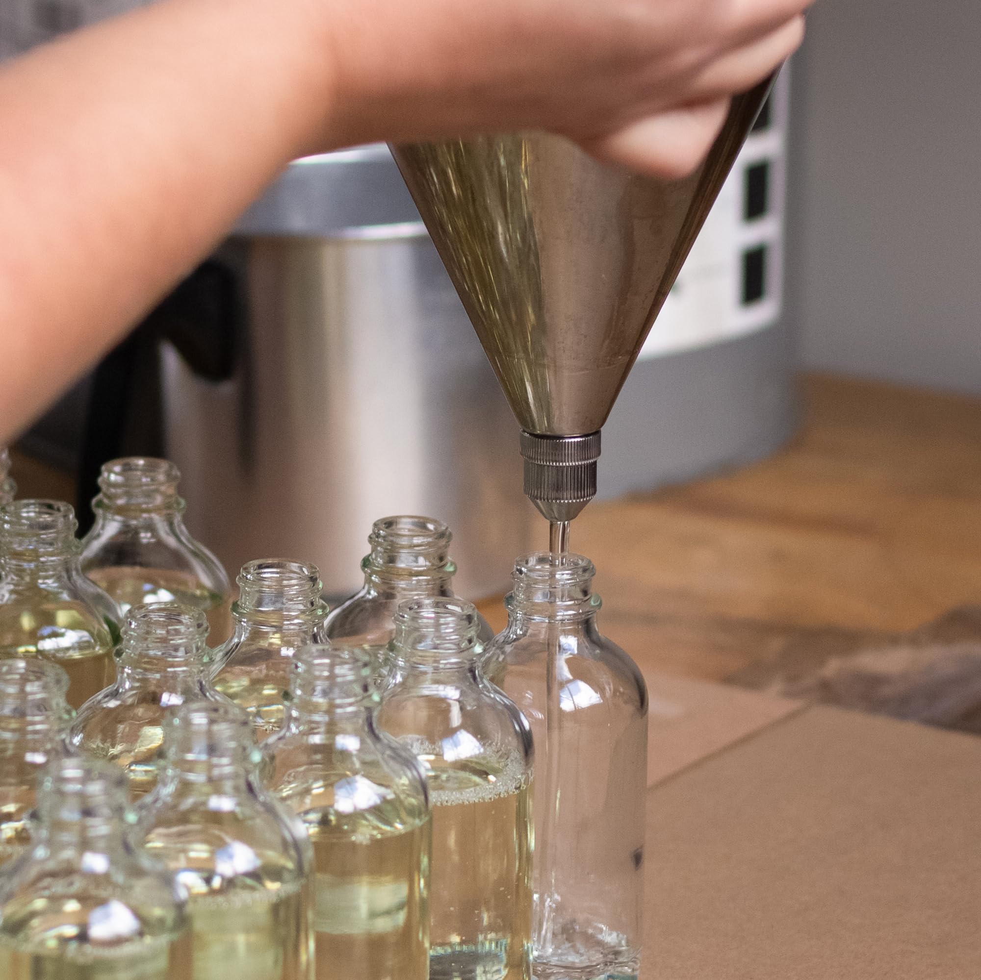 Reed diffuser with natural reeds in glass bottle