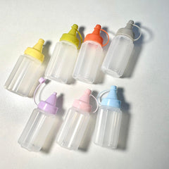 Eight 30ml mini condiment squeeze bottles in yellow color