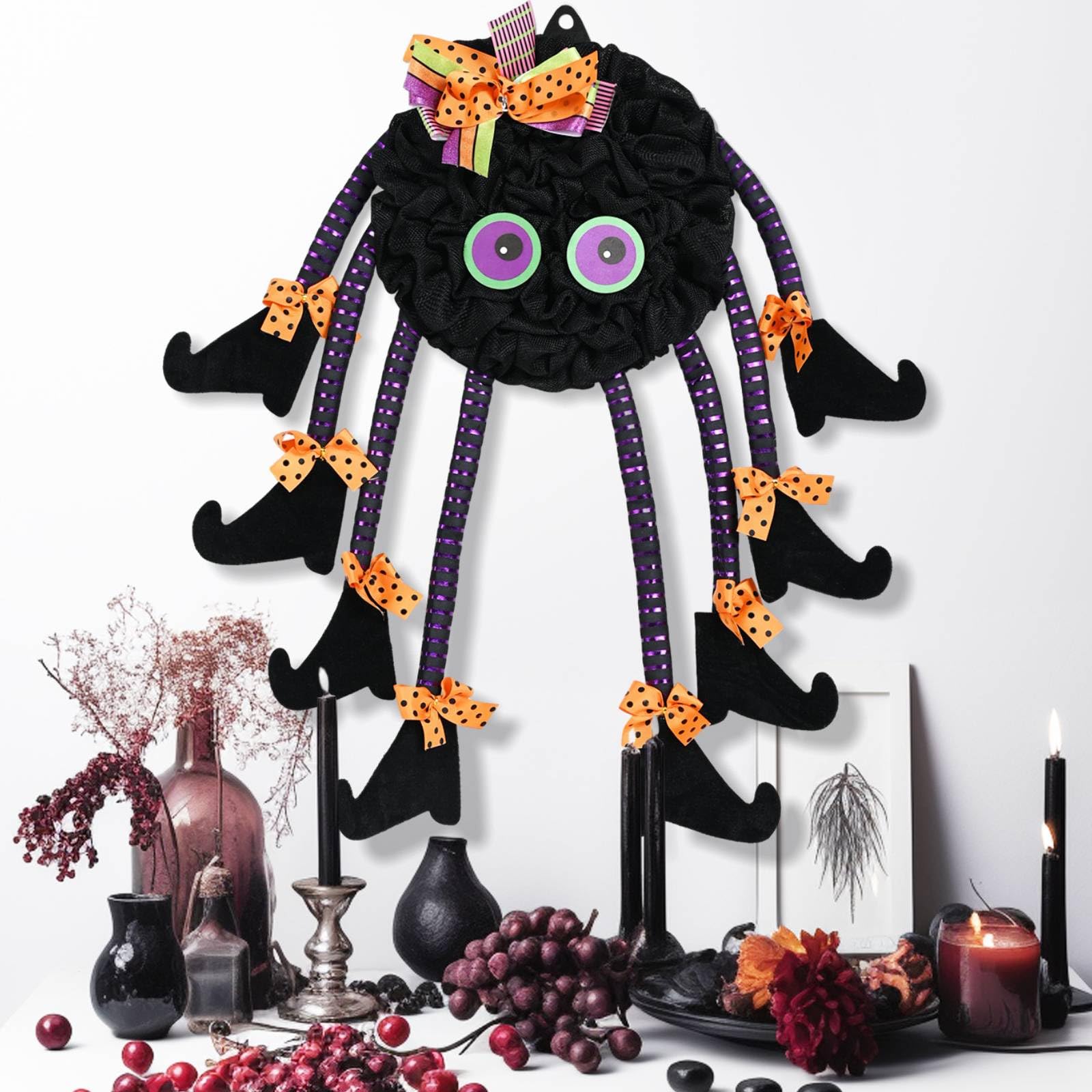 Wreath with eight witch legs and burlap like body