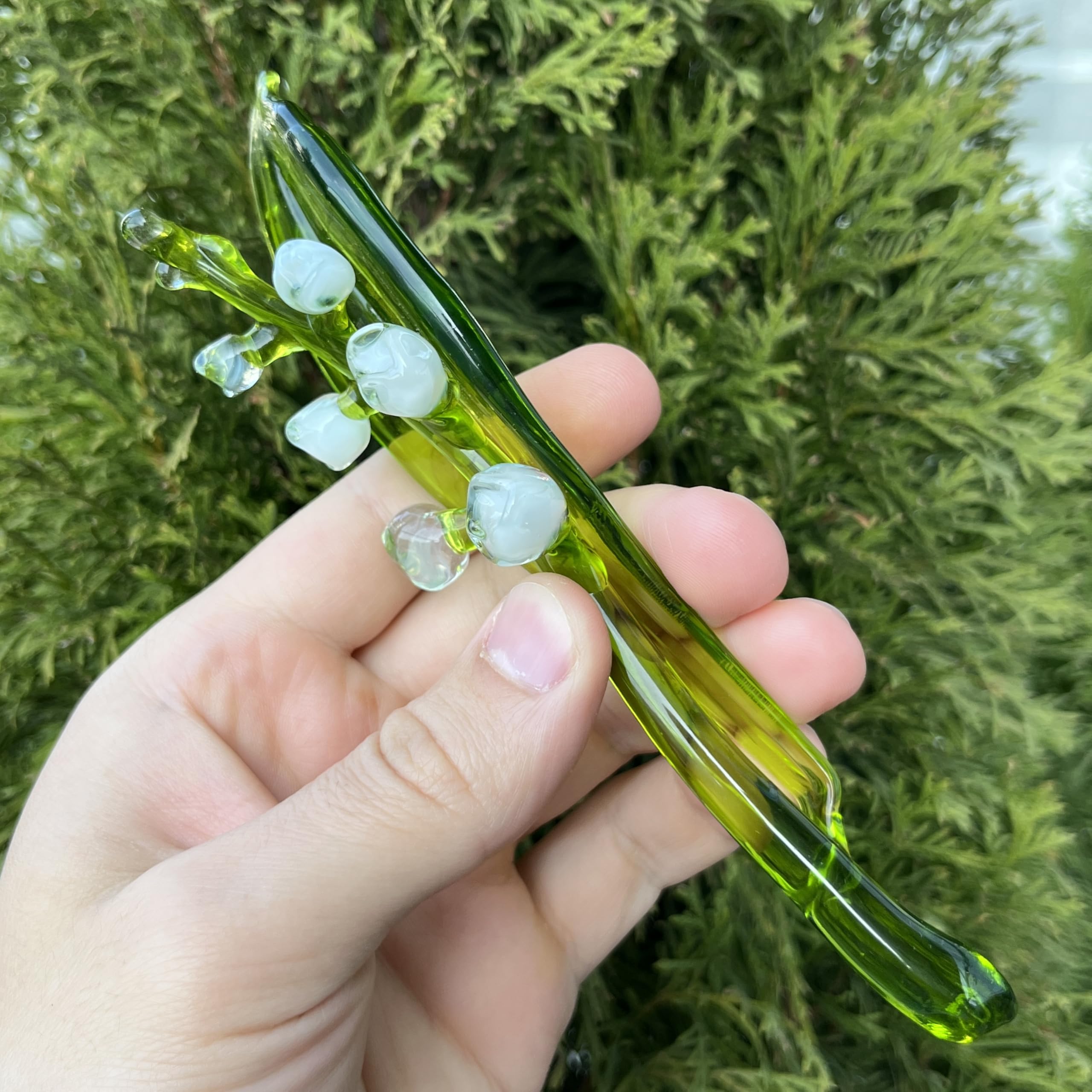 Elegant Lily of The Valley figurine made from clear and green blown glass