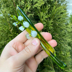Elegant Lily of The Valley figurine made from clear and green blown glass