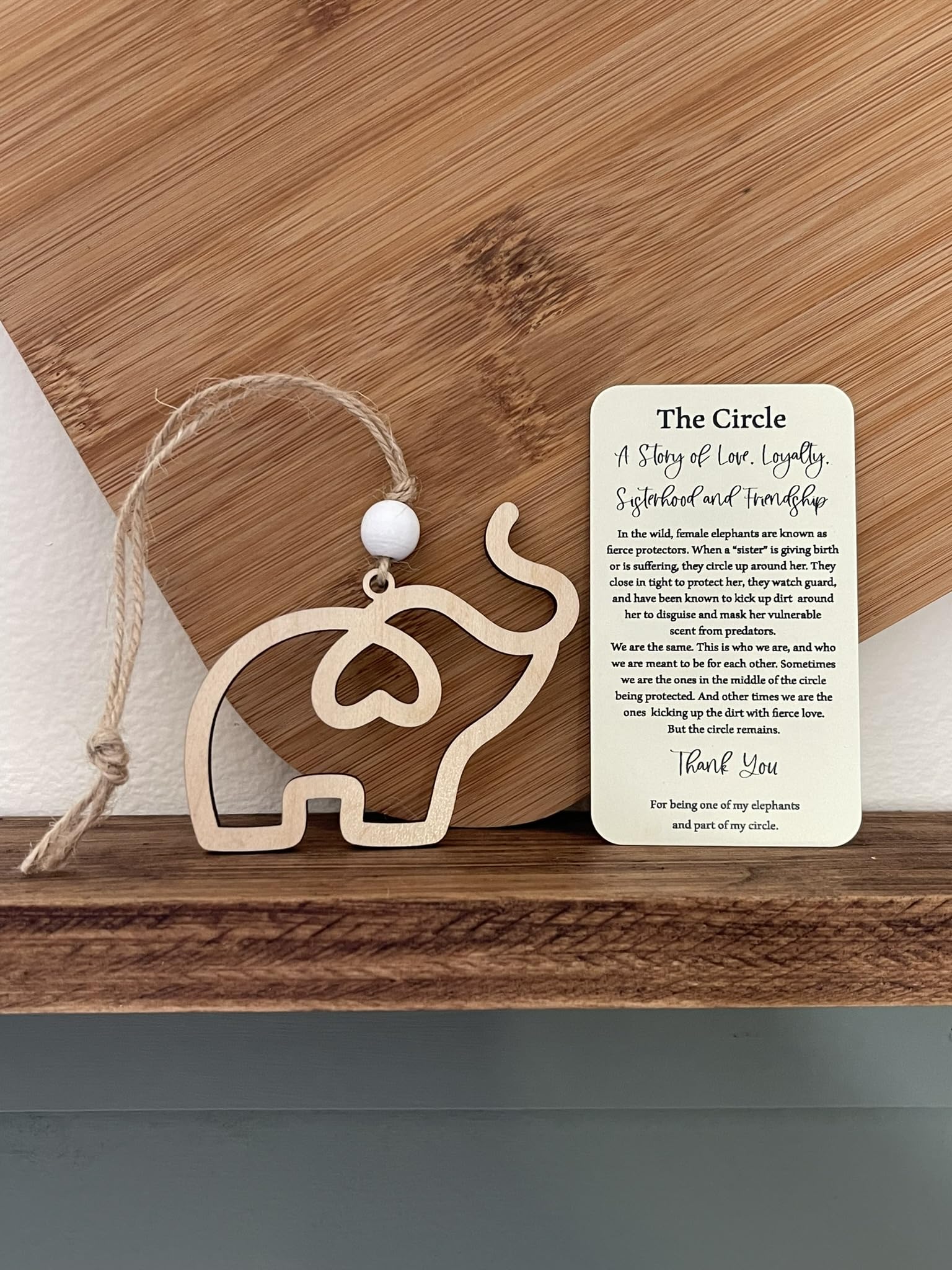 Gift-ready elephant ornament in cotton bag