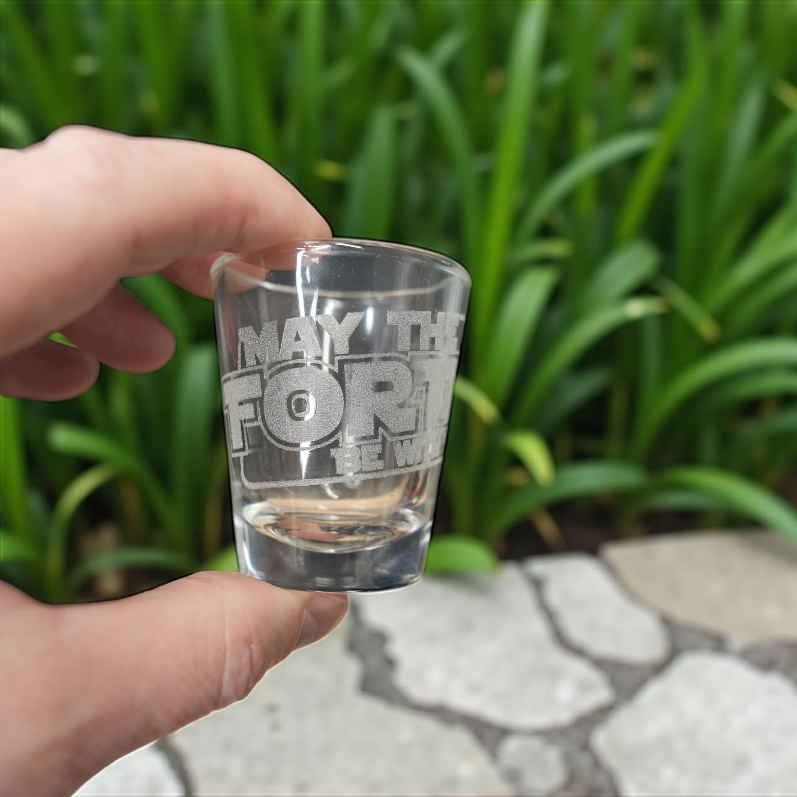 Thick protruding base with sheer rim shot glass