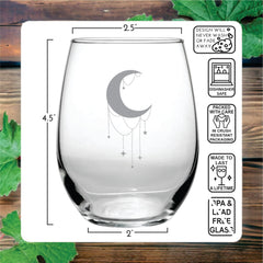 Engraved stemless wine glass featuring crescent moon and crystals
